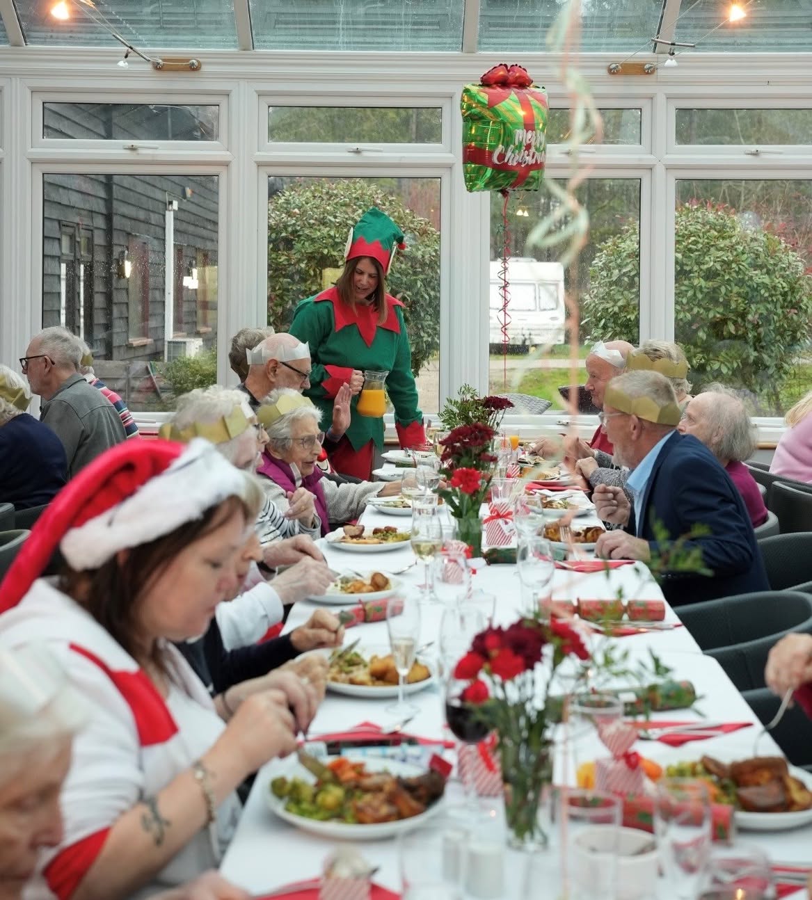 Guests at a long table during last year's Christmas lunch at Golf World Stansted